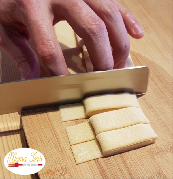 Cutting Pasta by hand in Italy at Mama Isa's Cooking School